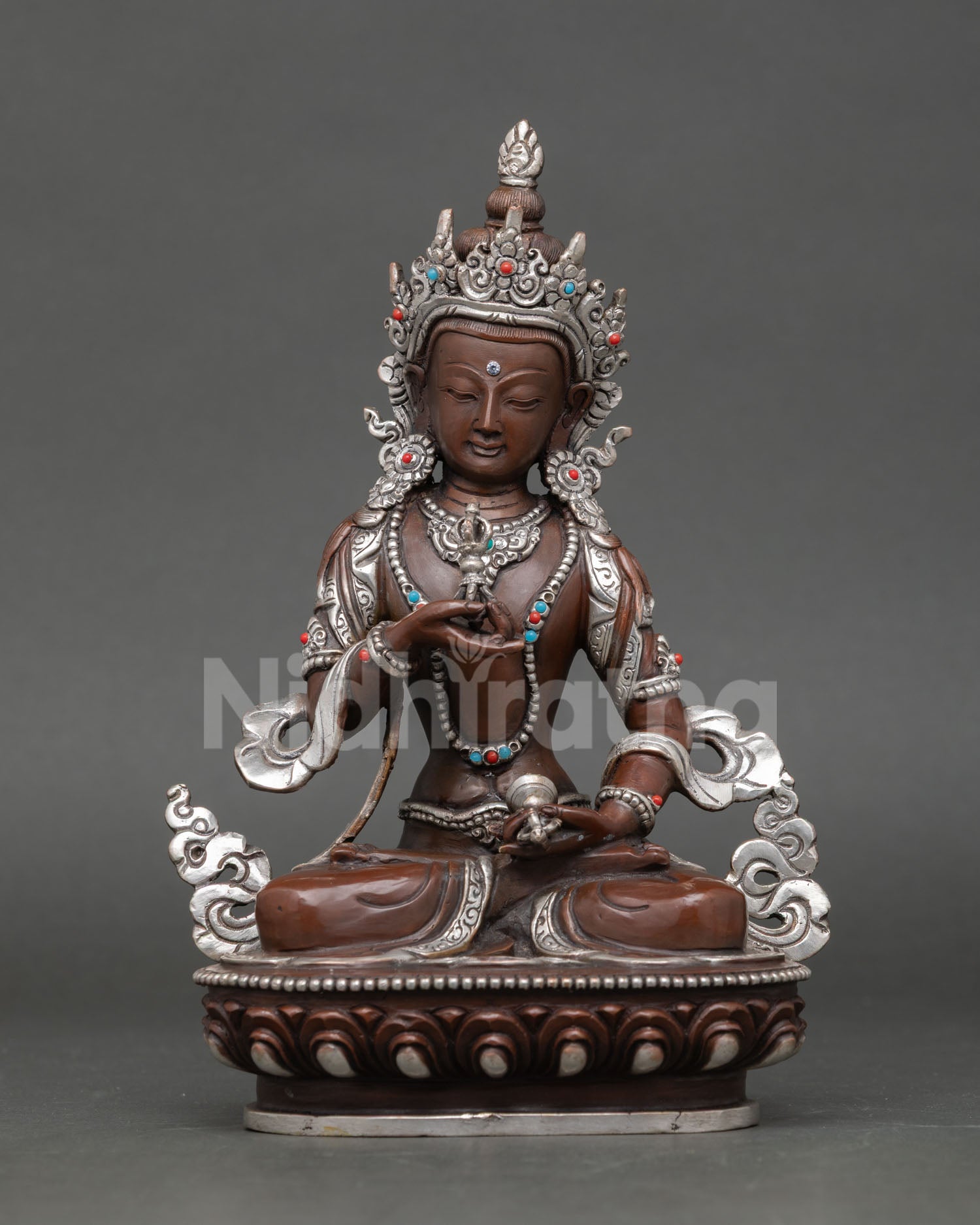 Front view of Vajrasattva statue handmade in copper with silver plated finish from Nepal