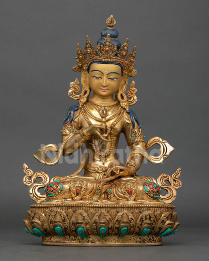 Front view of Vajrasattva statue seated on lotus pedestal with gold gilded copper finish from Nepal