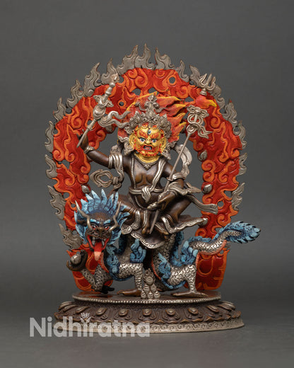 Front view of White Dzambhala statue handcrafted in Nepal with oxidized copper