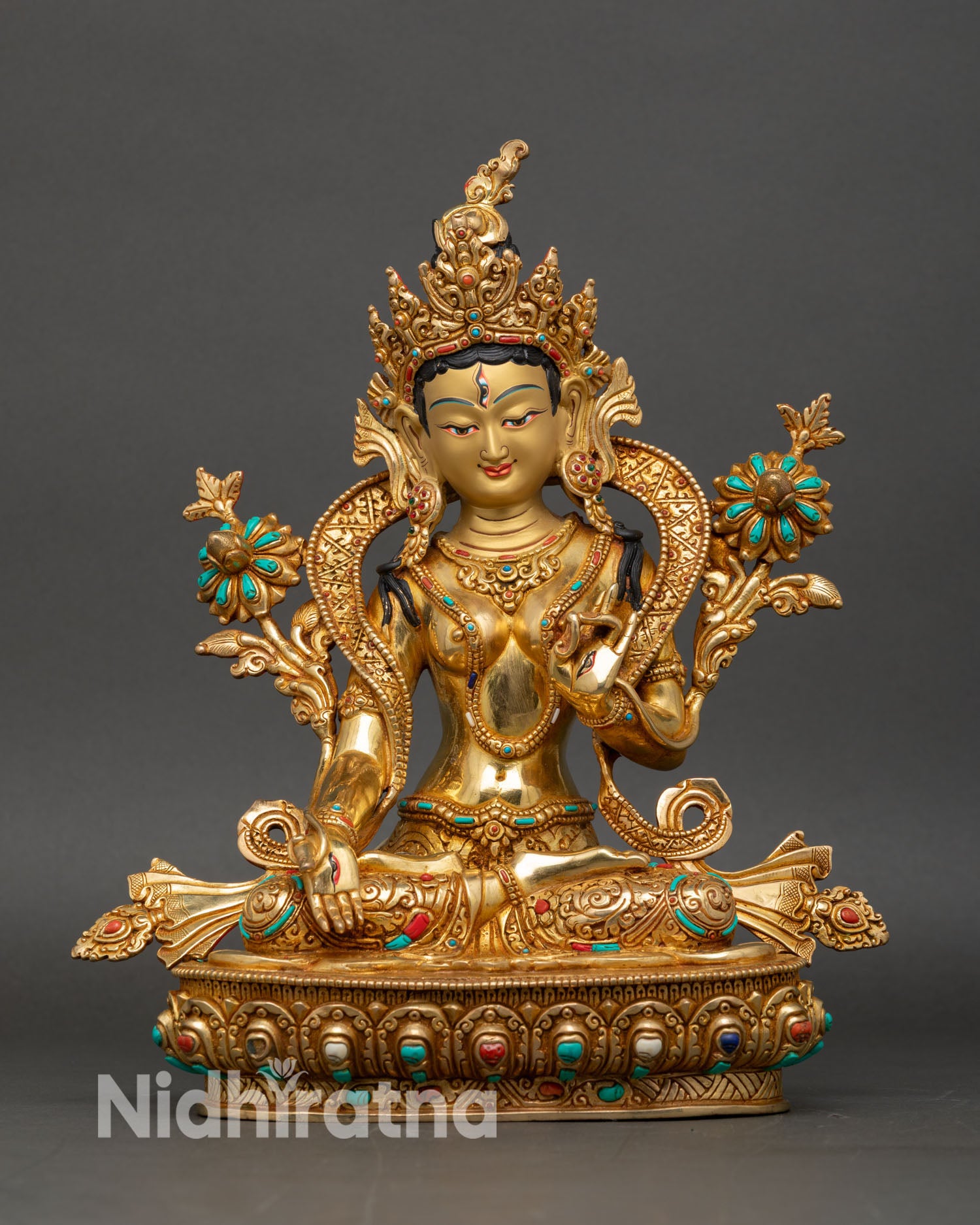 Front view of white tara seven eyed statue handmade copper gold gilded nepal