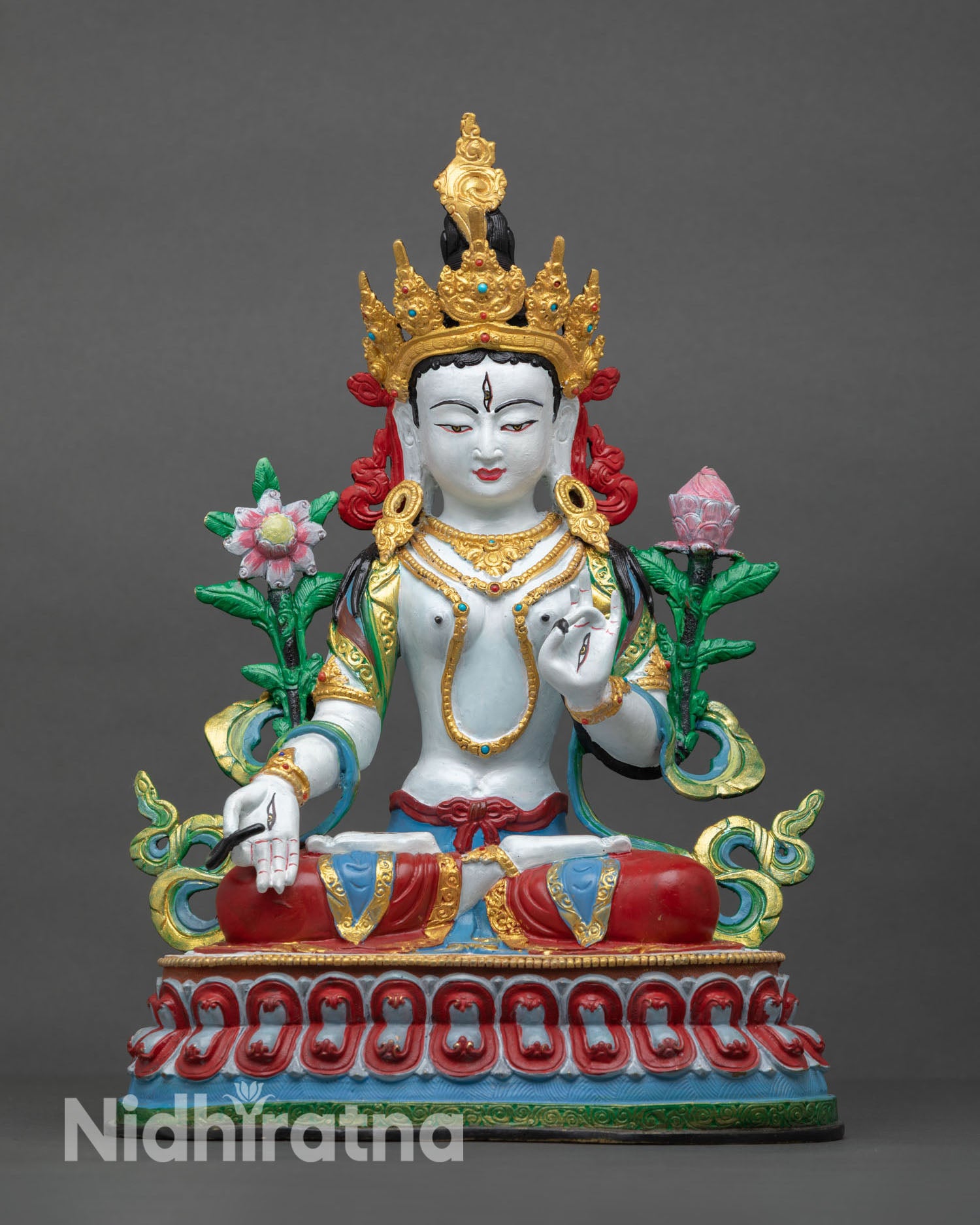 Front view of White Tara statue handcrafted in copper using lost-wax method with hand-painted details and lotus pedestal.