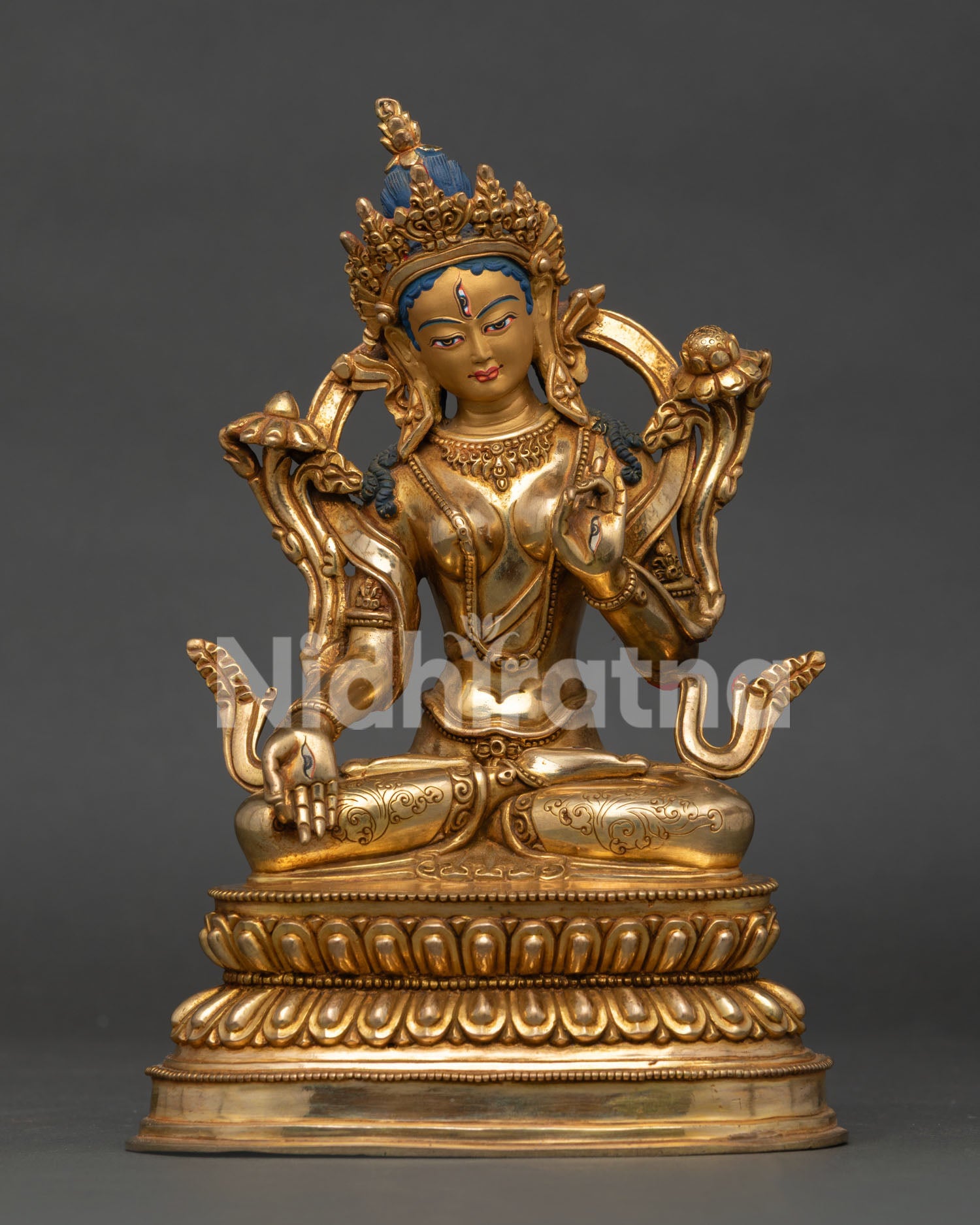 Front view of White Tara statue with 24K gold gilding and gold painted face handcrafted in Nepal