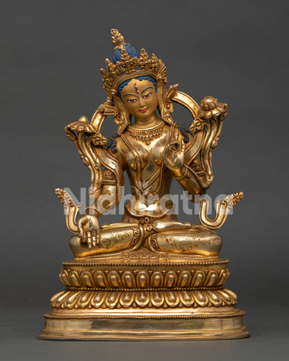 Front view of White Tara statue with 24K gold gilding and gold painted face handcrafted in Nepal