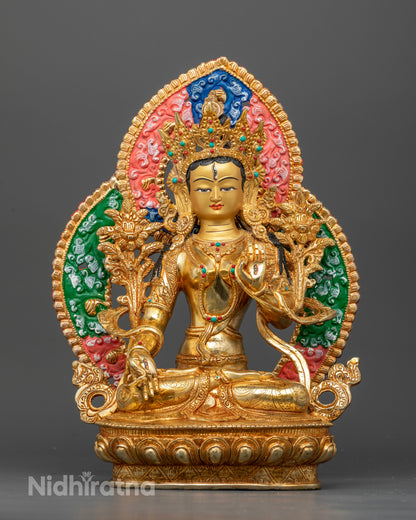 Front view of White Tara statue with seven eyes and 24K gold fire gilded copper