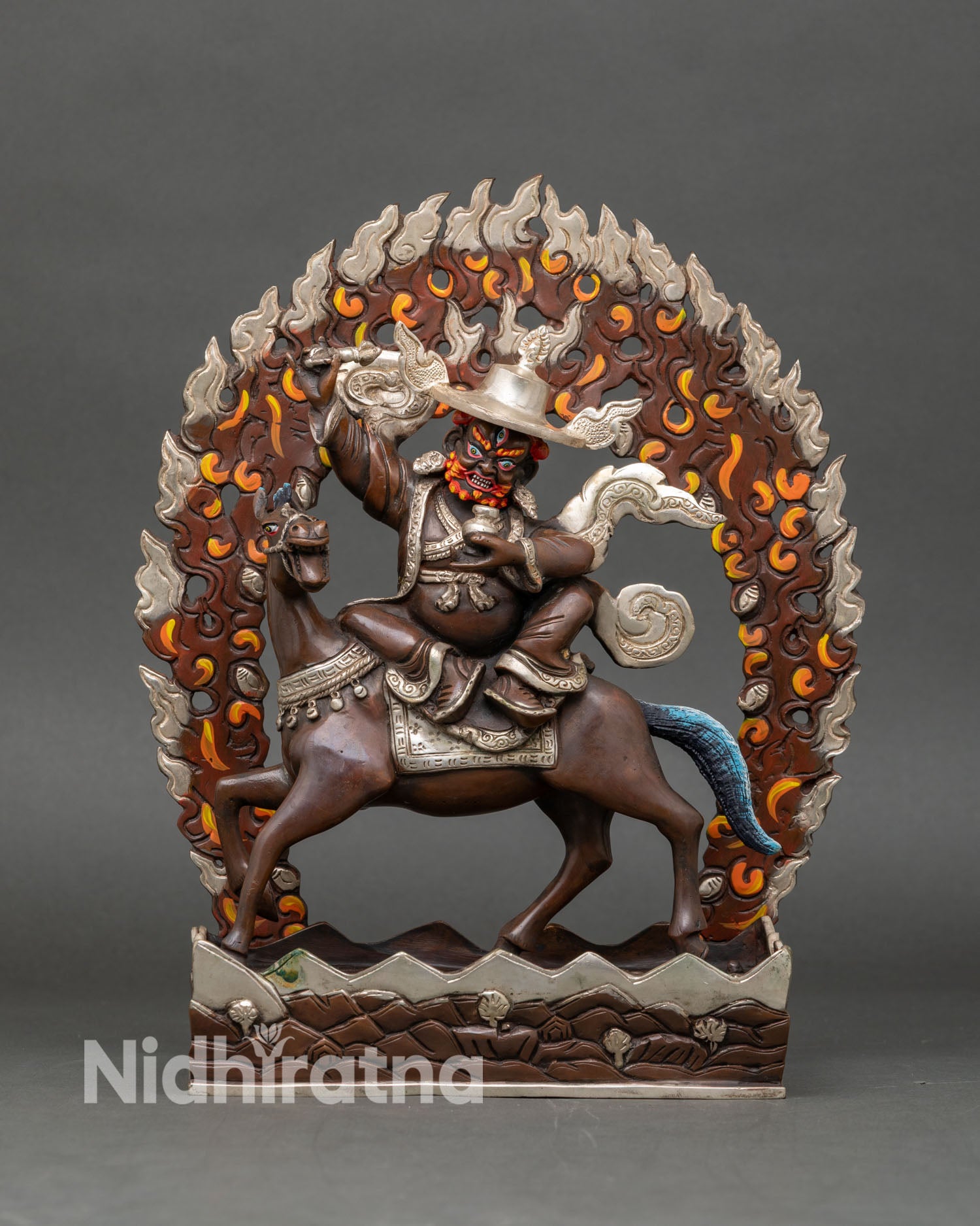 Front view of Pehar Gyalpo statue handmade copper Buddhist protector deity from Nepal oxidized silver plated finish lost wax technique horse riding