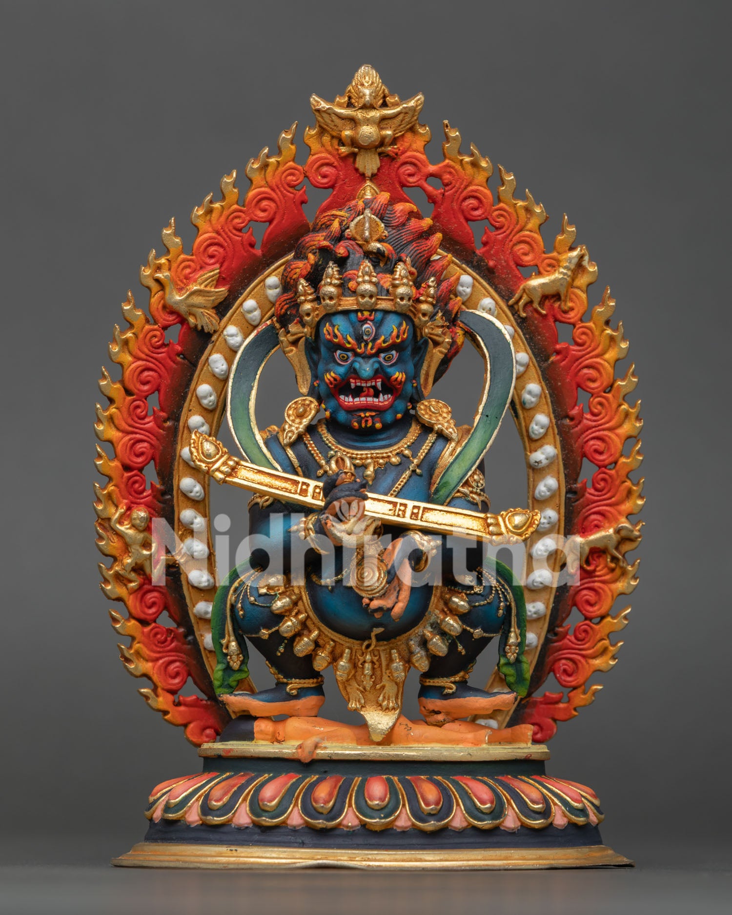 Front view of Sakya Mahakala statue handcrafted in Nepal copper with gold gilded details deep blue body and wrathful protector deity