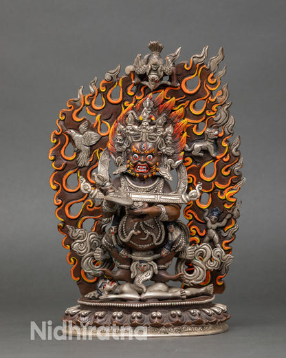 Front view of Sakya Mahakala statue wrathful deity oxidized copper silver Himalayan