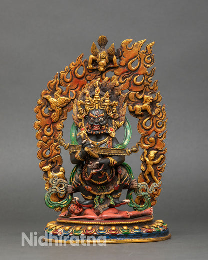 Front view of Sakya Mahakala statue wrathful protector gold gilded hand-painted Nepalese sculpture