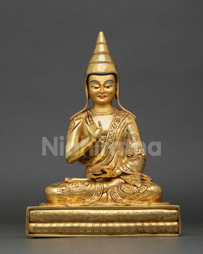 Front view of Santaraksita statue handcrafted in Nepal copper with 24K gold gilding and serene gold finished face for Buddhist altar decor