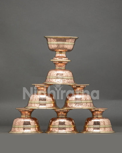 Front view seven water offering bowls handcrafted copper Tibetan altar set