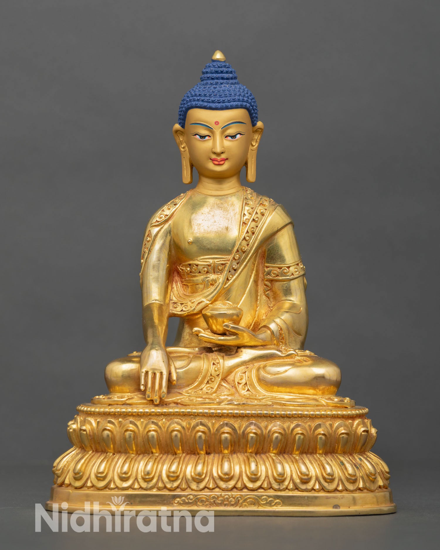Front view of Shakyamuni Buddha statue, copper alloy gold fire gilded finish, seated lotus pedestal earth witness mudra, Nepal handcrafted sculpture