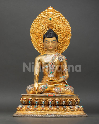 Front view of Shakyamuni Buddha statue copper sculpture Nepal lost wax casting 24K gold gilding double lotus pedestal bhumisparsha mudra sacred Buddhist altar art