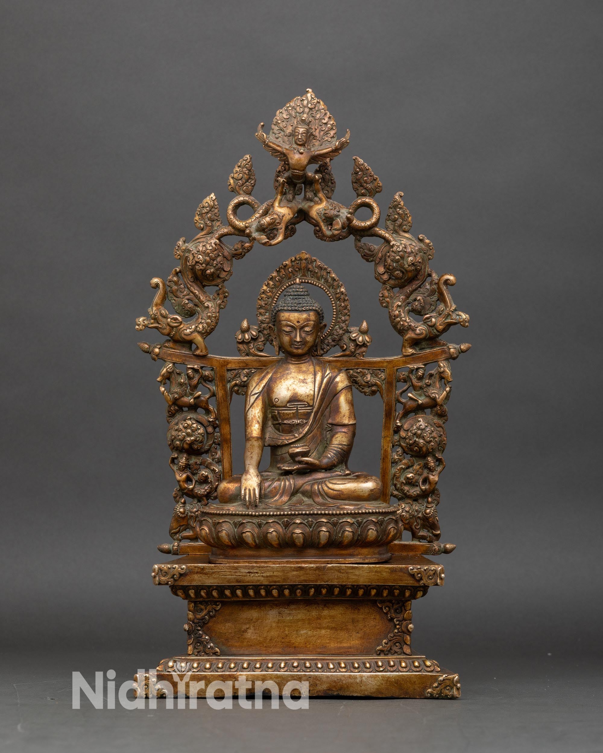 Front view of Shakyamuni Buddha statue, gold fire-gilded copper with antique finish
