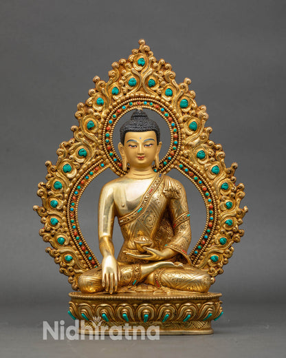 Front view Shakyamuni Buddha statue gold gilded copper lotus pedestal Patan Nepal