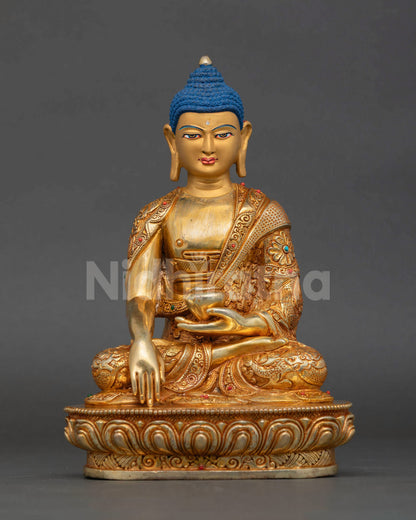 Front view of Shakyamuni Buddha statue handcrafted in Nepal copper with gold gilding for meditation altar and spiritual decor