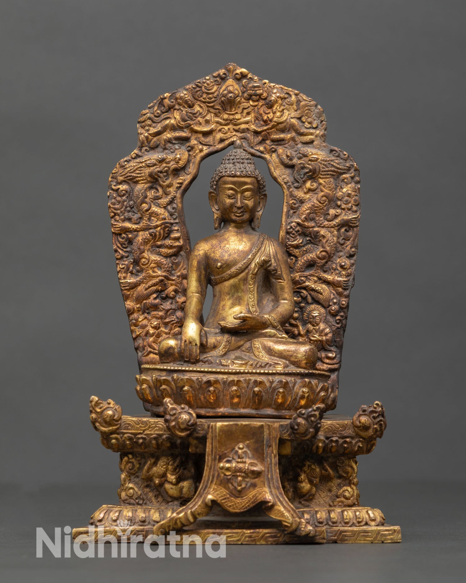 Front view of Shakyamuni Buddha statue handmade copper sculpture gold fire gilded antique finish