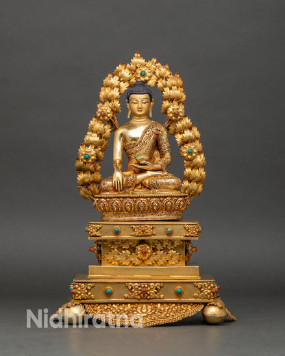 Front view Shakyamuni Buddha statue Kathmandu copper gold gilded bhumisparsha mudra lotus throne Nepal