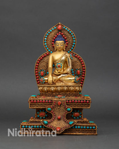 Front view of Shakyamuni Buddha statue ornate lotus throne copper sculpture 24K gold fire gilding Patan style Himalayan Buddhist sacred art