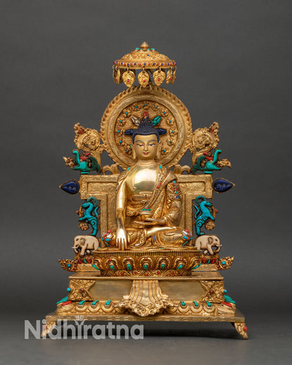 Front view of Shakyamuni Buddha statue seated on ornate throne copper sculpture Nepal lost wax casting