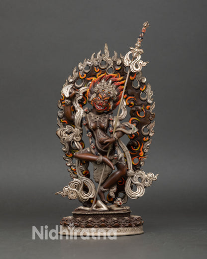 Front view of Simha Mukha Statue handcrafted oxidized copper sculpture silver plated details fierce guardian deity