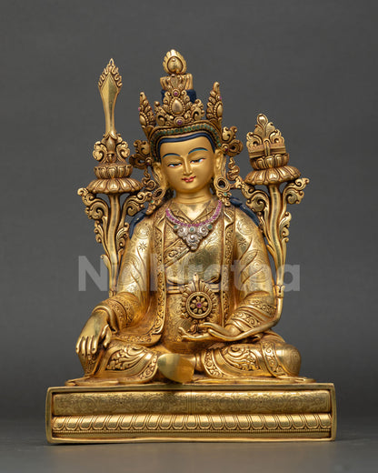 Front view of Trisong Detsen statue Tibetan Dharma King handcrafted in Nepal gold gilded copper with semi precious stones for altar decor