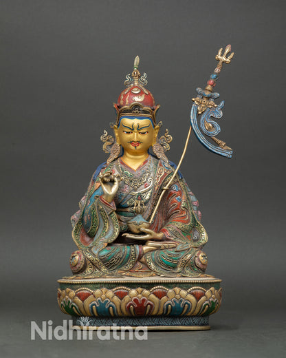 Front view of Tsokye Dorje statue Lake Born Vajra copper sculpture from Patan Nepal 24K gold face lotus pedestal Vajrayana deity