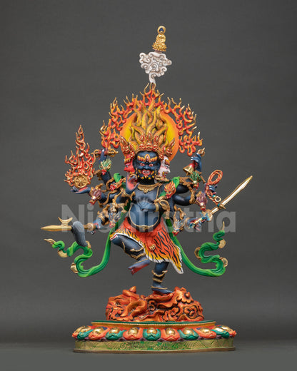 Front view of Ucchusma statue wrathful purification deity handcrafted in Nepal copper with deep blue body and flaming halo for Buddhist altar