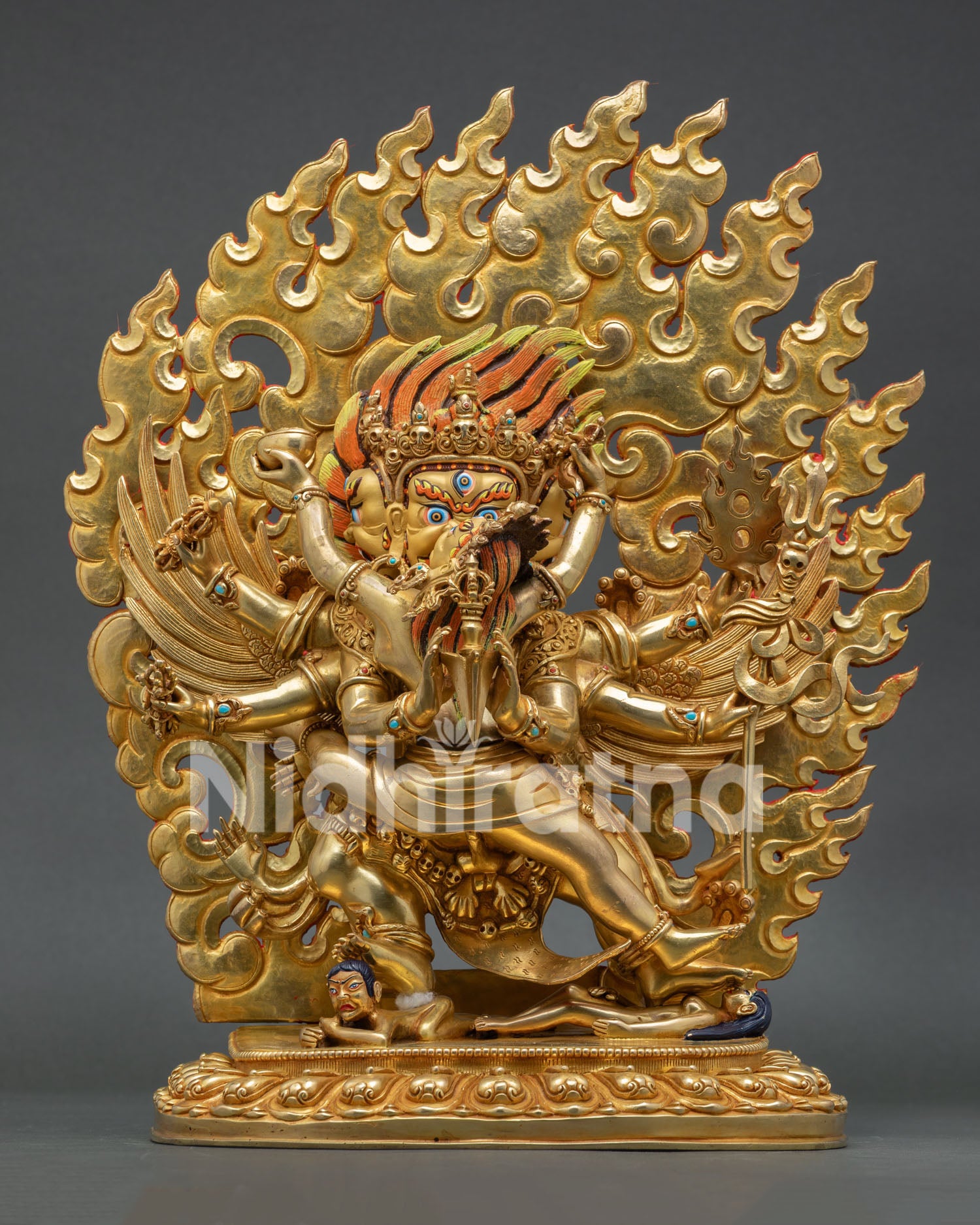 Front view of Vajrakilaya statue with consort gold fire gilded copper art Nepal