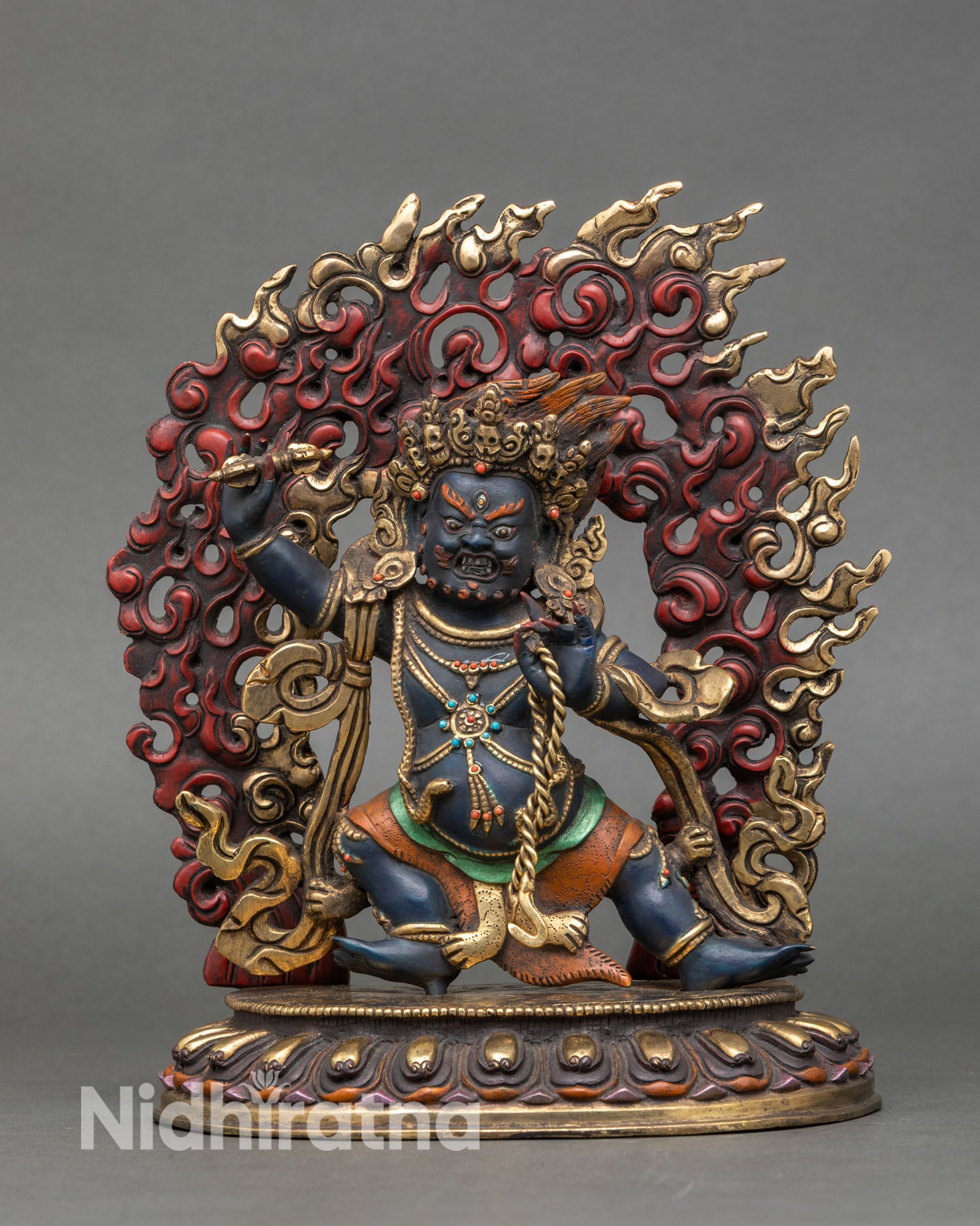 Front view of Vajrapani statue hand-painted wrathful deity copper gold gilded stones Nepal