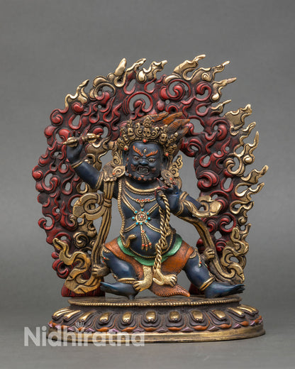 Front view of Vajrapani statue hand-painted wrathful deity copper gold gilded stones Nepal