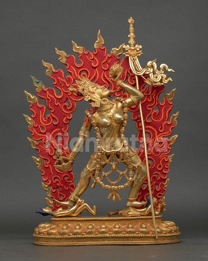 Front view of Vajrayogini statue handcrafted in copper with 24k gold fire gilding dynamic dancing posture flaming halo and Tibetan Buddhist altar spiritual decor.