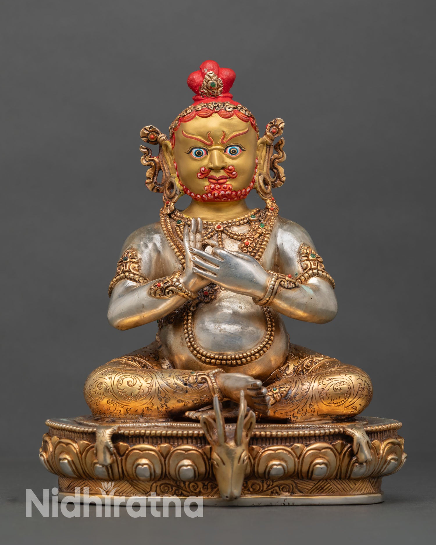 Front view of Virupa statue in copper with gold fire gilded finish silver details and lotus throne