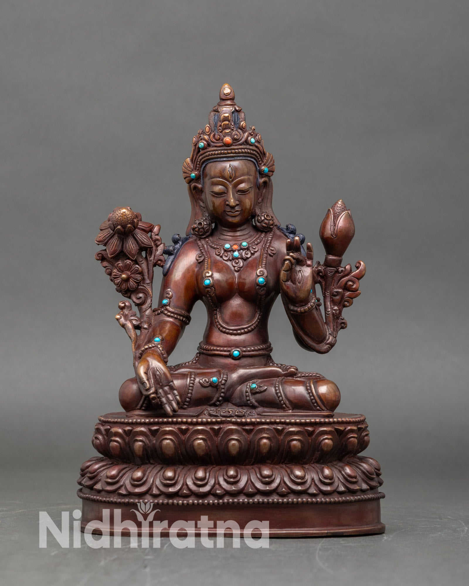 Front view of White Tara oxidized copper statue handmade Nepalese Buddhist deity art