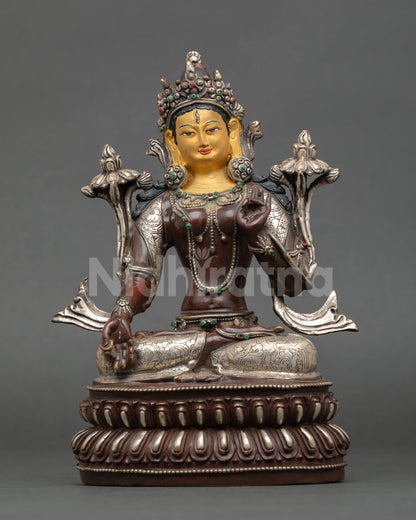 Front view of White Tara statue, gold painted face all seeing seven eyes Nepal Newari artisan Buddhist healing goddess sculpture