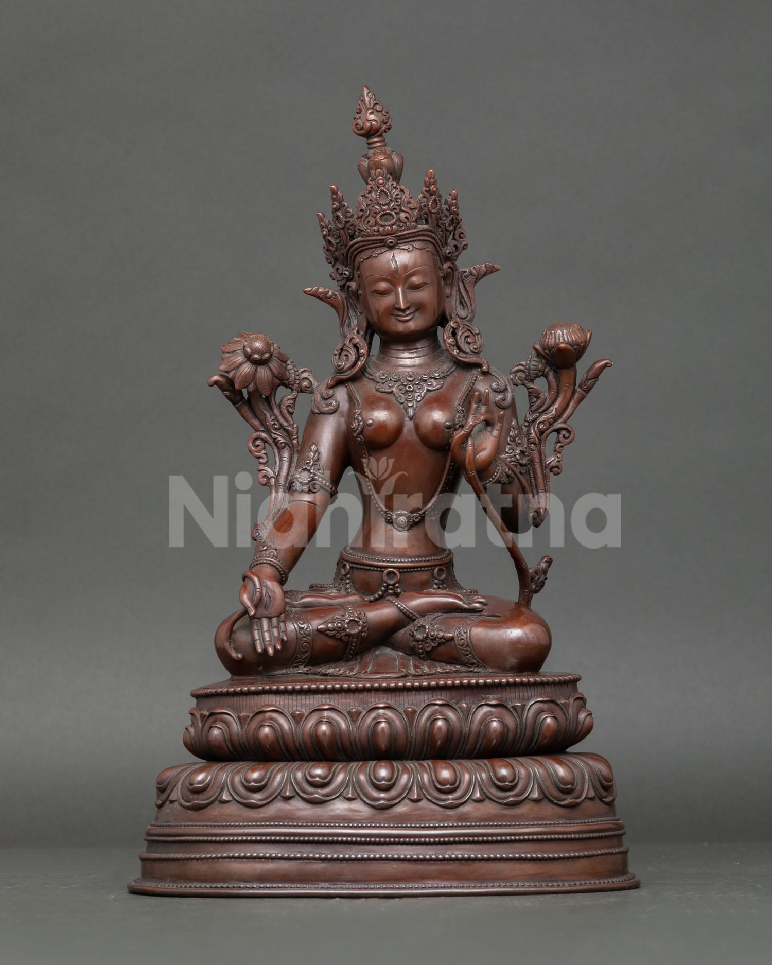 Front view White Tara statue, oxidized copper, seated goddess of longevity on lotus, Nepal art