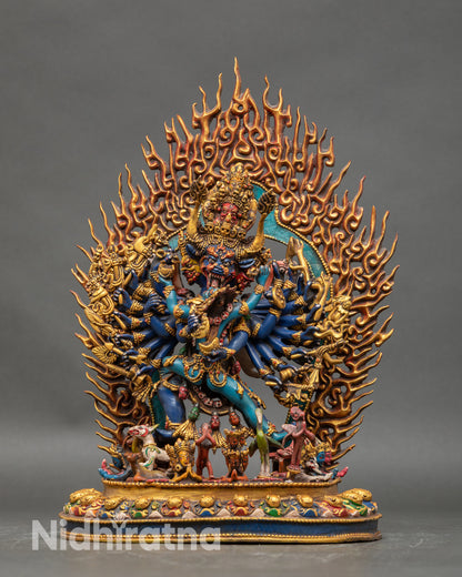Front view of Yamantaka Consort statue nine faces sixteen arms handcrafted Nepalese copper acrylic colors lotus pedestal
