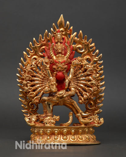 Front view of Yamantaka yab-yum statue sixteen armed wrathful deity copper gold gilded lotus throne nepal