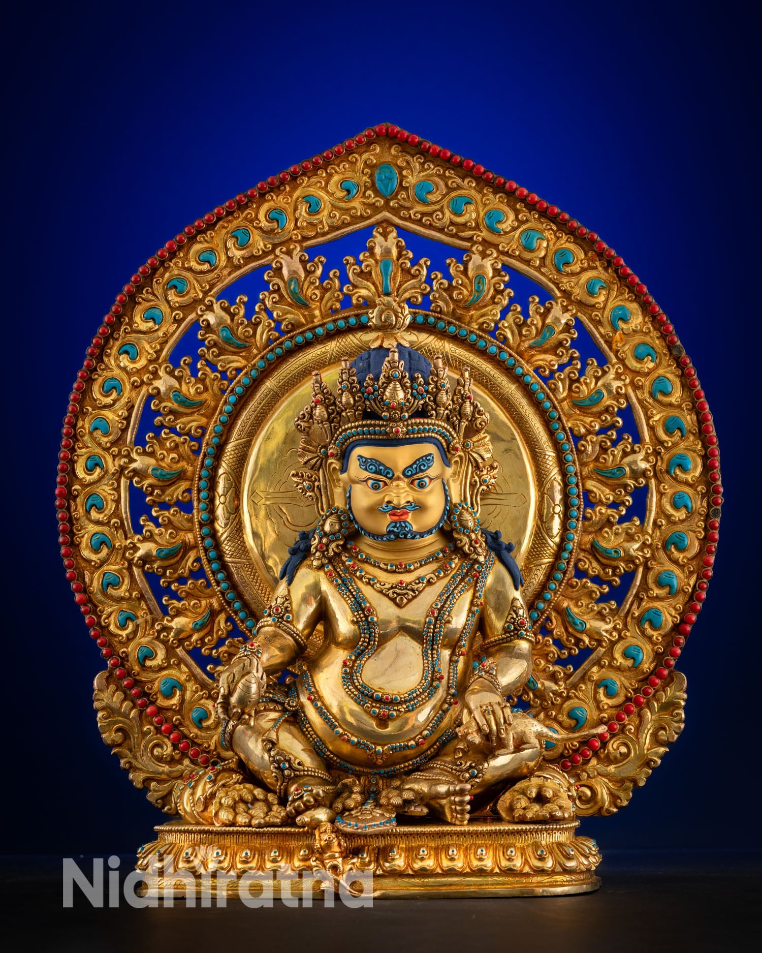 Front view of Dzambhala statue, fire gilded copper, Kathmandu Nepal craftsmanship