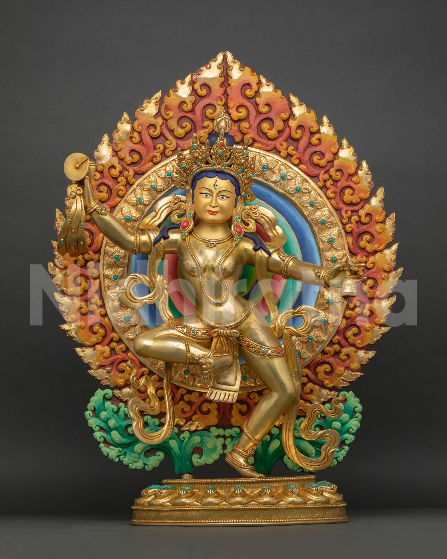 front view, machig labdron copper statue gold gilded, dancing chöd yogini on lotus throne with painted halo