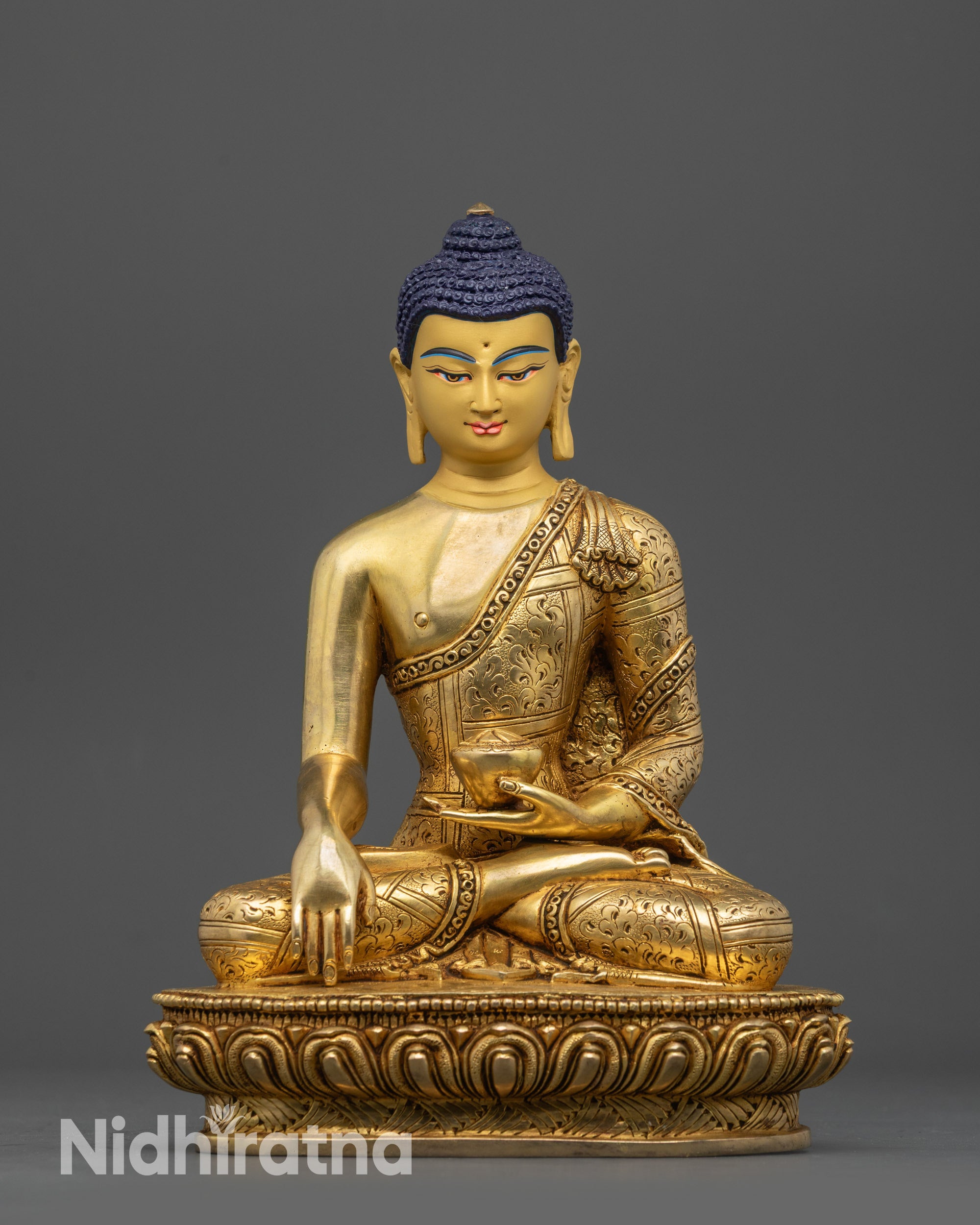 front view Golden Shakyamuni Buddha Statue handmade in Nepal with lotus seat and robe details