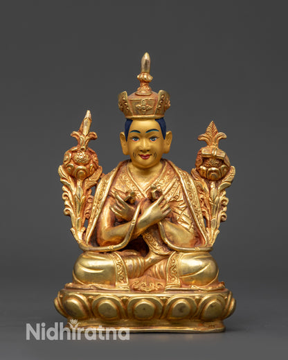 front view Gyalwang Karmapa statue with black crown on lotus seat, gold-gilded face