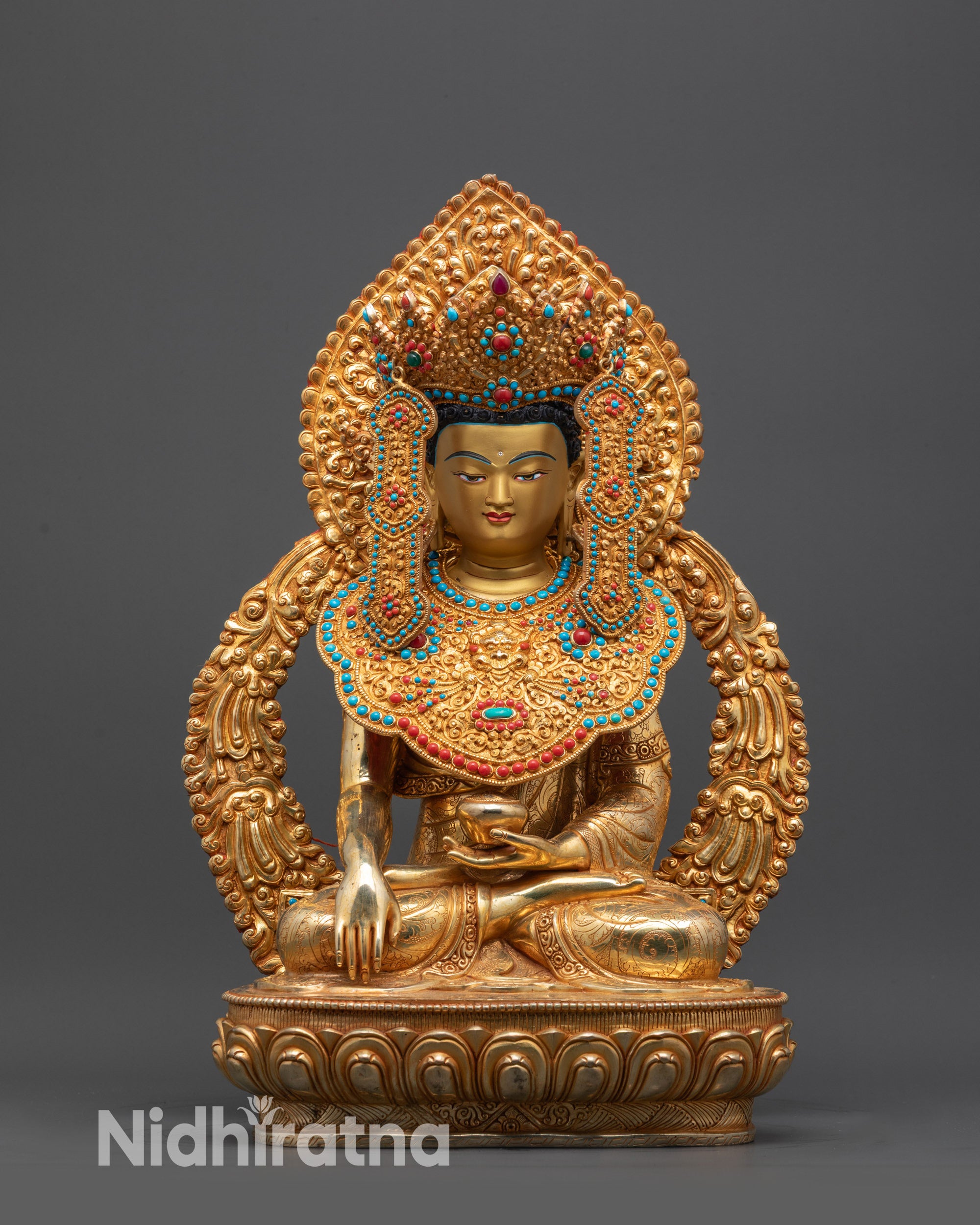 front view Jowo Shakyamuni Rinpoche statue seated on lotus pedestal with gold fire gilded finish