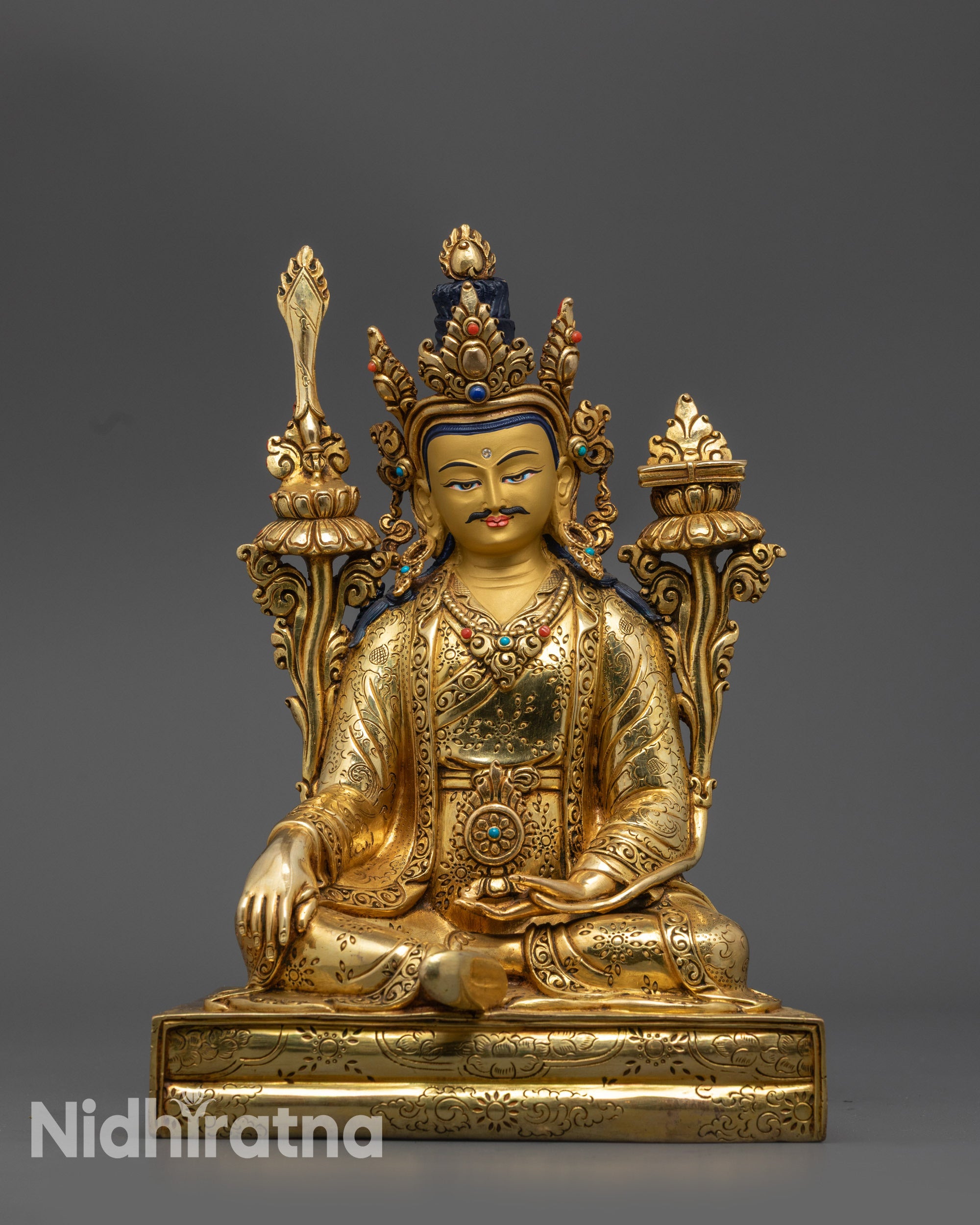 front view King Trisong Detsen statue with gold-gilded face and intricately carved crown