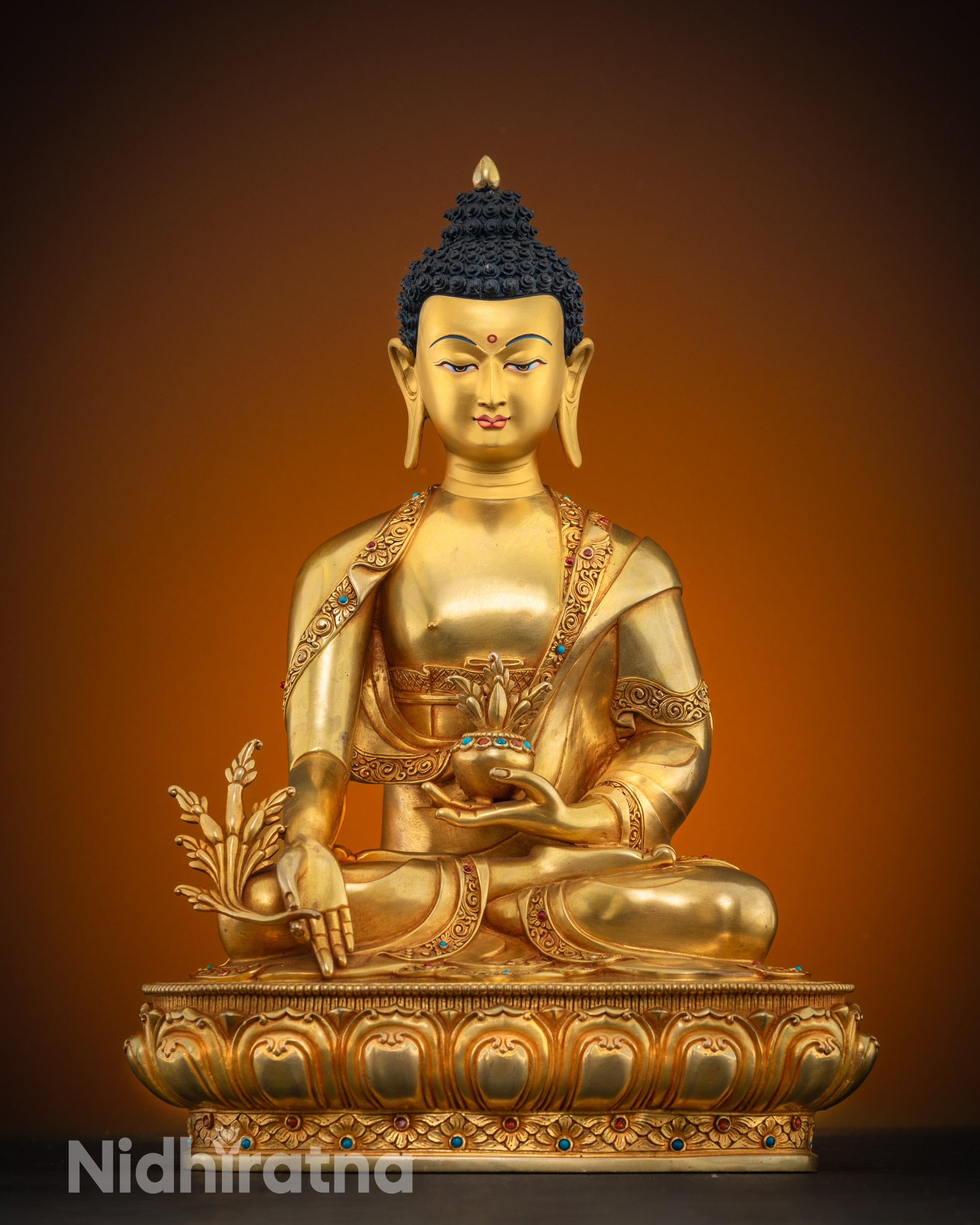 front view Medicine Buddha statue copper with gold-painted face holding herbs and alms bowl