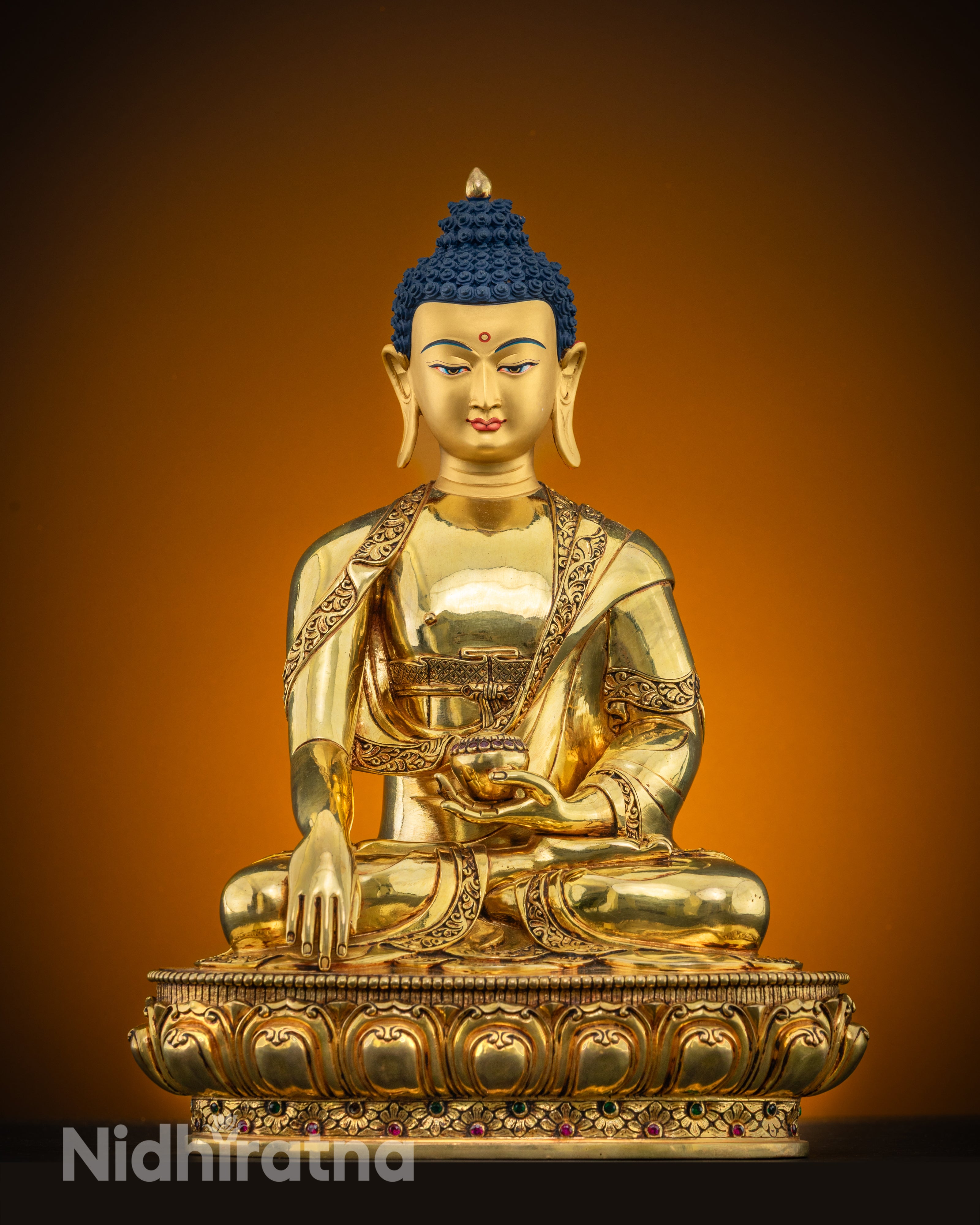 front view Shakyamuni Buddha statue copper with gold-painted face and semi-precious stone details