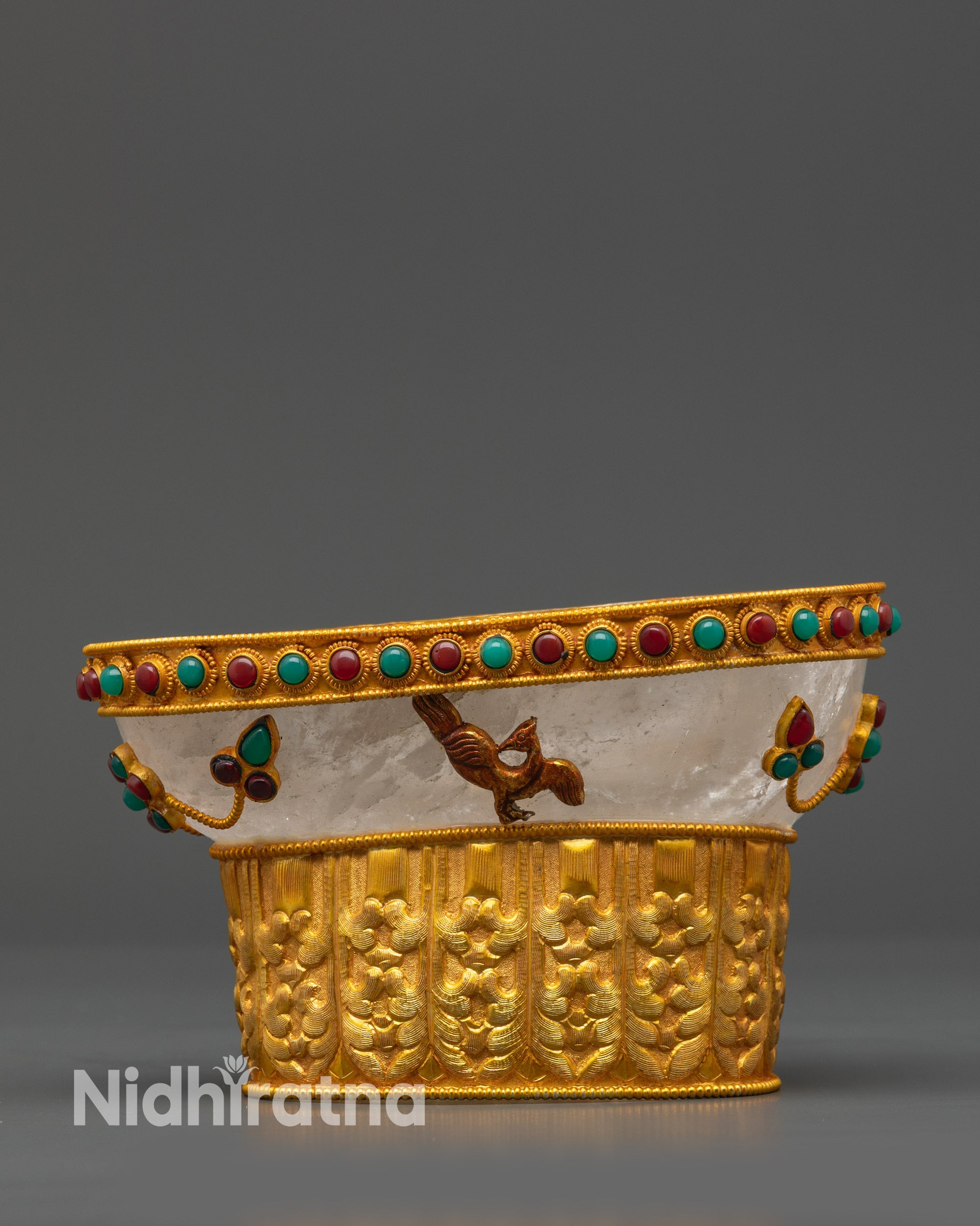front view Tibetan Crystal Kapala with gold-plated base and semi-precious stones
