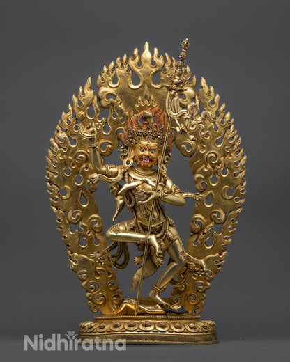 front view Troma Nagmo statue with gold gilded face and five skull crown
