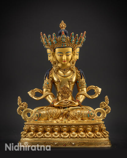 front view Vairocana Buddha statue with four gold-gilded faces on lotus pedestal from Nepal