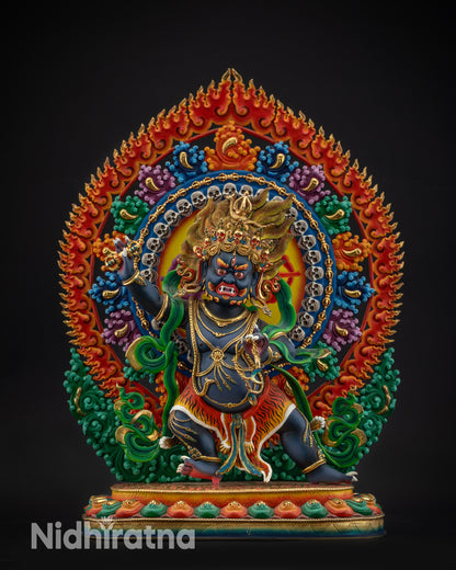 front view Vajrapani statue with raised vajra and lasso in commanding stance

