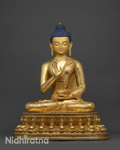 front view amoghasiddhi buddha statue gold gilded face on double layered lotus
